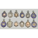 Collection of twelve silver fob medals, circa 1920's, '30s, to include, darts, football etc.