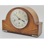 1930's domed top mantel clock, eight day movement, silvered dial, 23cm.