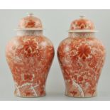 Pair of Chinese iron red temple jars and covers,