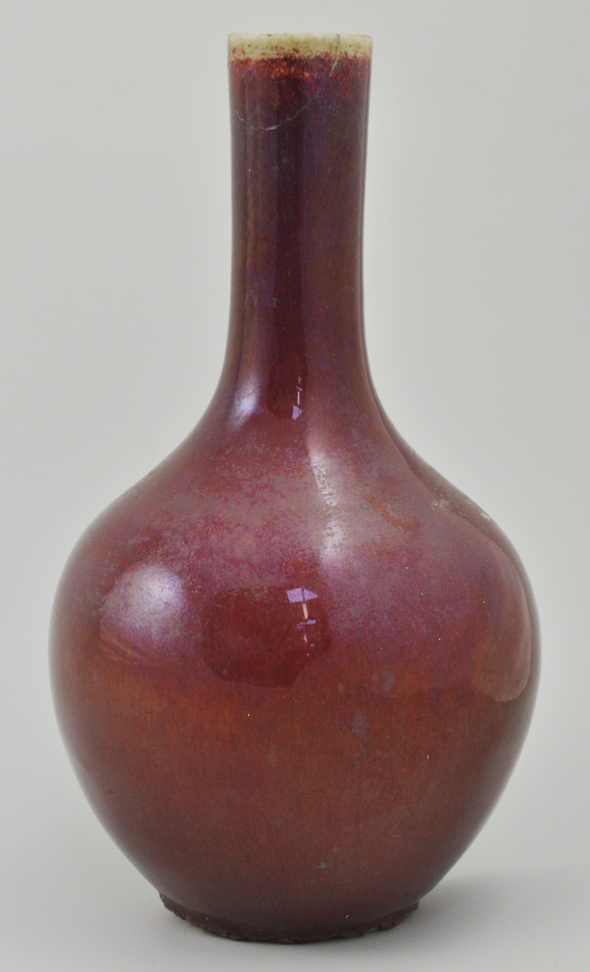 19th Century Chinese flambe glazed vase, un-marked base, height 22cm, (restored rim).