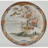 Japanese Kutani wall charger, painted with birds amongst foliage, diameter 36cm.