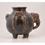 Chinese brown glazed Earthenware temple jar, of elephant form, 13cm.