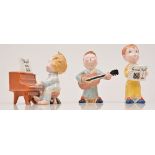 A Beswick Bedtime Chorus set, comprising Girl with Harp 1826, Pianist 1801 and Piano 1802,