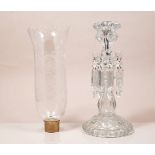 Pair of modern Baccarat candlesticks, each with prismatic drops, storm shades scroll decoration,