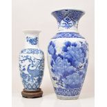 Japanese blue and white vase, lightly fluted decorated with birds and flowers,