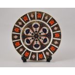Seven Royal Crown Derby plates, modern Imari pattern, no. 1128, diameter 27cm.