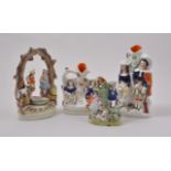 Staffordshire arbour group, figures by a boat, restored, 20cm and three Staffordshire spill vases,
