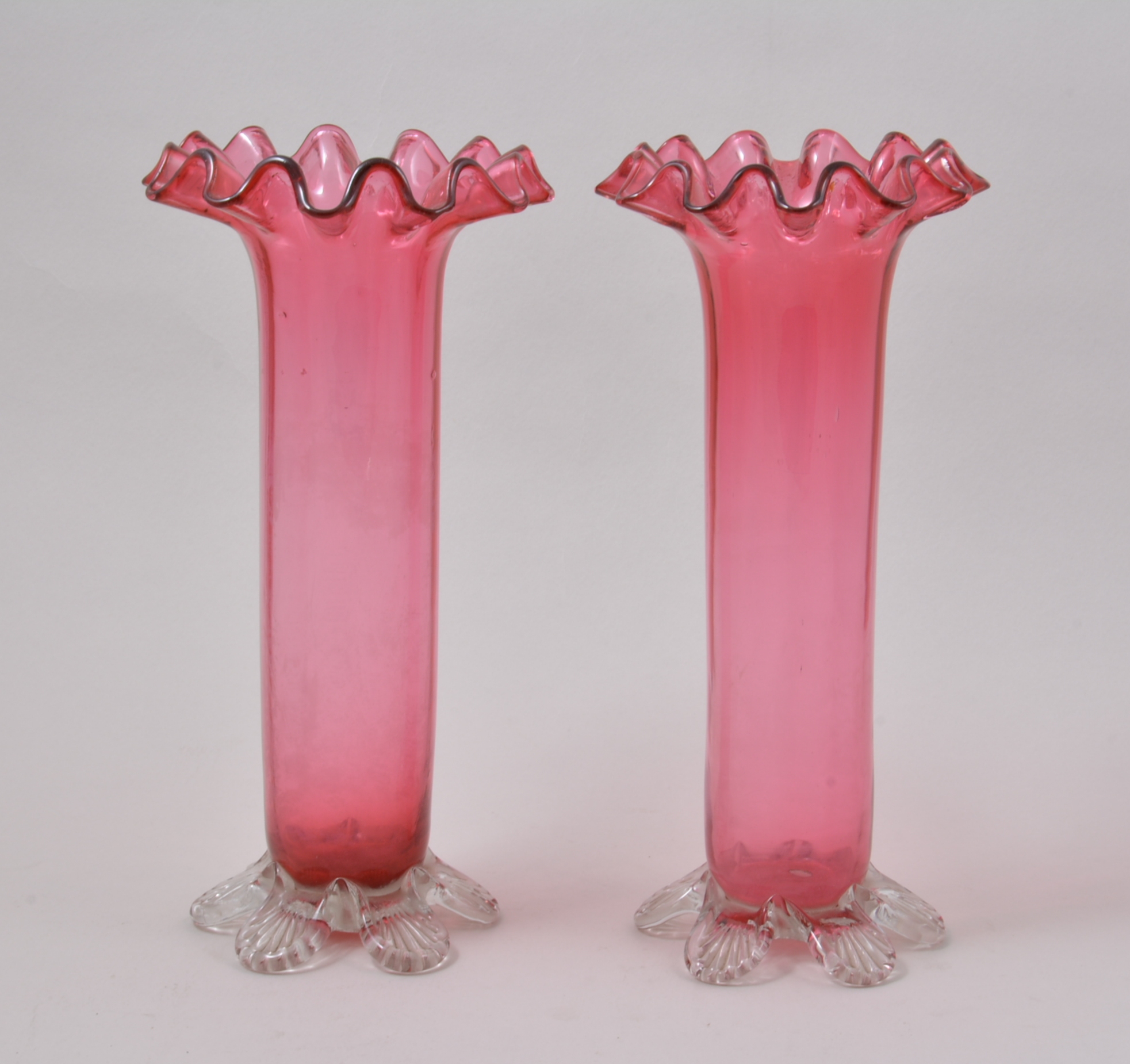 Pair of Cranberry glass vases, crimped rims, 27cm.