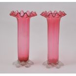Pair of Cranberry glass vases, crimped rims, 27cm.