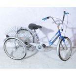 Mission Trilogy Tricycle, with six gears, basket attached.