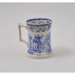 Staffordshire blue and white printware mug, decorated with river landscape and ruins, 13cm.