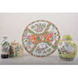 Cantonese porcelain plate, reserves painted in coloured enamels, diameter 26cm,