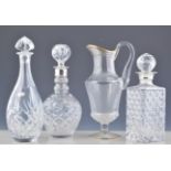 Lead crystal decanter, rounded bowl, double ringed neck, with a plated collar, spherical stopper,