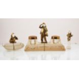 Peter Tereszczuck, a bronze, carved ivory and glass desk set, circa 1930,