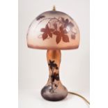 La Rochere, a cameo glass table lamp, the domed shade acid-etched with butterflies and foliage,