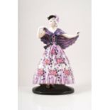 Stefan Dakon for Goldscheider, a pottery figure of a lady, circa 1930, in crinoline dress,