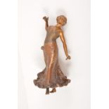 Continental, a patinated bronze sculpture of a Spanish dancer, circa 1920, holding castanets,