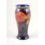 William Moorcroft, a 'Pomegranate' vase, circa 1920, baluster form, factory marks, blue signature,