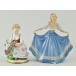 German porcelain figure of a child and ram, blue printed mark, "Unter Weiss Bach",
