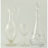 Etched glass claret jug and matching wine glass,
