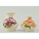 Small Moorcroft squat vase, "Hibiscus" pattern on a cream ground, 8cms,