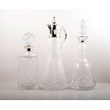 Lead crystal spirit decanter, with a silver collar, faceted stopper, 27cm,