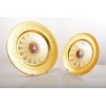 Aynsley gold ground cabinet plate, centre panel decorated with fruit,