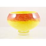 Dave Buck, a studio glass open footed bowl, 2007, internally mottled yellow and red,