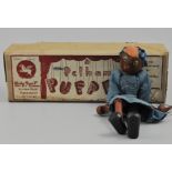 Pelham puppet, modeled as a black lady, boxed.