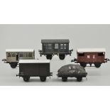 Hornby "O" gauge:  twelve goods wagons, together with ten other goods wagons, some re-painting,