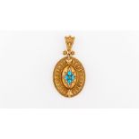 A Victorian yellow metal oval pendant,