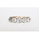 A traditional diamond five stone ring, diamonds (5),