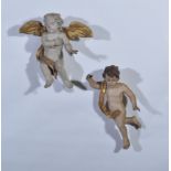 A Neapolitan style carved wood and painted gesso cherub, probably 19th Century,