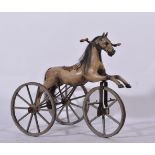 A French painted wood hobby horse tricycle, chain driven, horse grey with horse hair mane and tail,