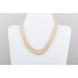 A three row graduated cultured pearl necklace,