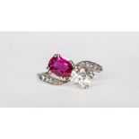 A ruby and diamond traditional crossover ring,