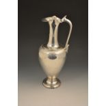 A Victorian silver ewer shape claret jug, by Edward Hutton, London 1884,