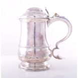 A George II silver baluster shaped tankard, by John Langlands, Newcastle 1753, moulded girdle,