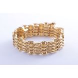 A hallmarked 18 carat yellow gold bracelet,