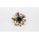A yellow and white metal sapphire and diamond cluster ring,