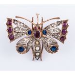 A gemset moth brooch/pendant with sapphires, rubies,