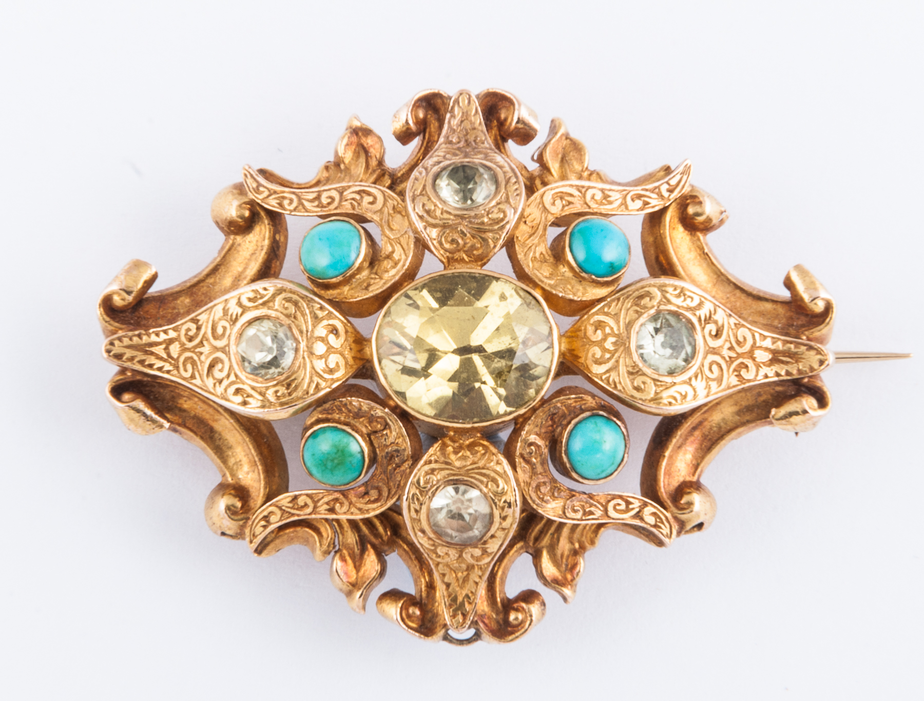 A Victorian yellow metal oval brooch,