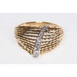 A yellow metal diamond dress ring,