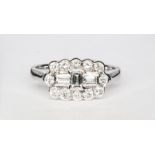 A modern diamond set cluster ring,