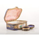 A Sevres style blue Royale serpentine bonbonnerie, probably late 19th Century, the lid reserved,