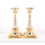 A pair of Royal Crown Derby silver shaped candlesticks, date mark for 1976, Old Imari pattern,