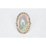 An opal and diamond oval cluster ring,