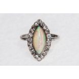 An opal and diamond marquise shaped dress ring,