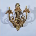 Set of four French ormolu wall lights, each with three lights,