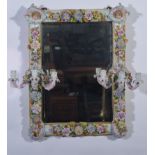 A German porcelain framed girandole, rectangular bevelled plate,